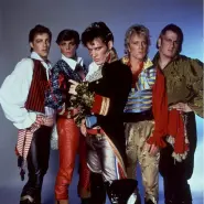 Cover art for Dog Eat Dog lyrics by Adam and the Ants