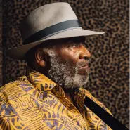 Cover art for Cakewalk Into Town lyrics by Taj Mahal