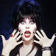 Cover art for 2 Big Pumpkins lyrics by Elvira, Mistress of the Dark